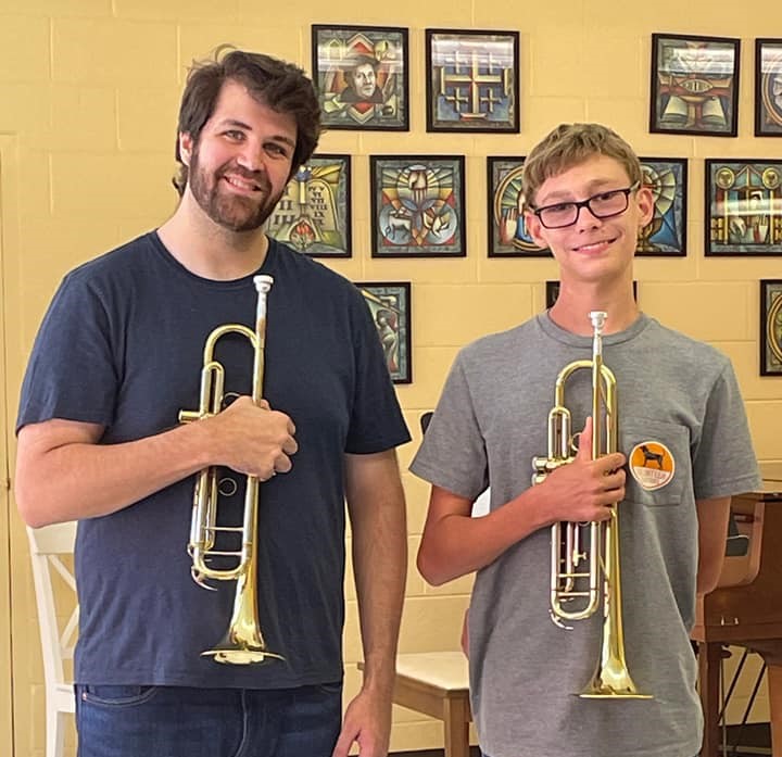 Conservatory students with brass instruments